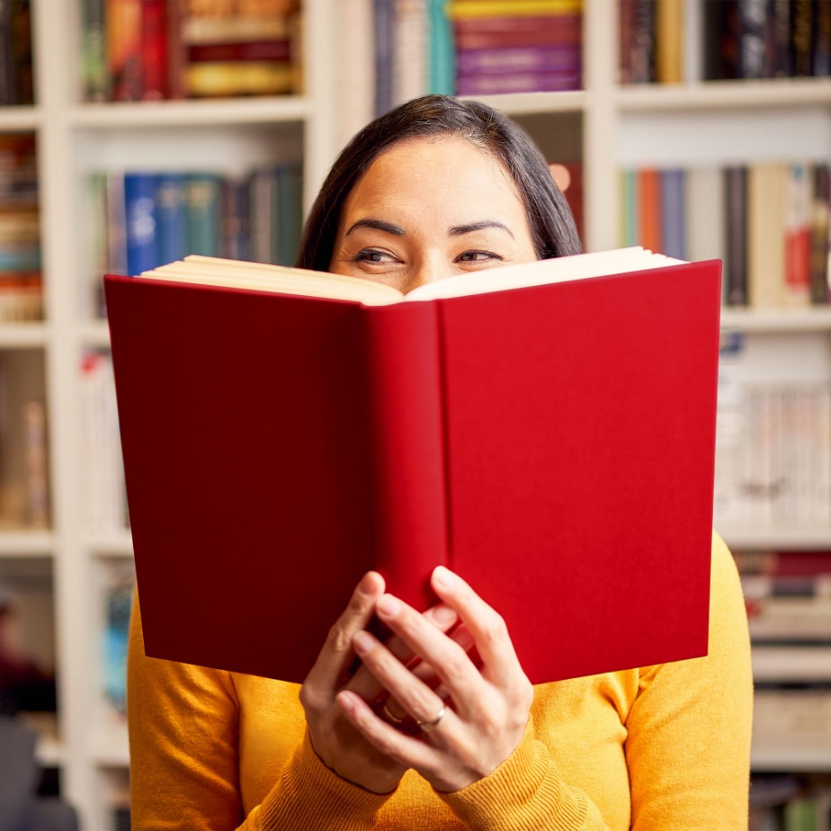 Woman reading book Woman reading red book